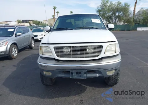 2001 Ford F150 Supercrew из США, поврежденный, VIN 1FTRW08L01KF71613